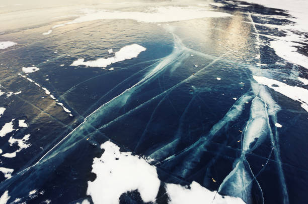 istock Ice on the frozen lake. 1009077706