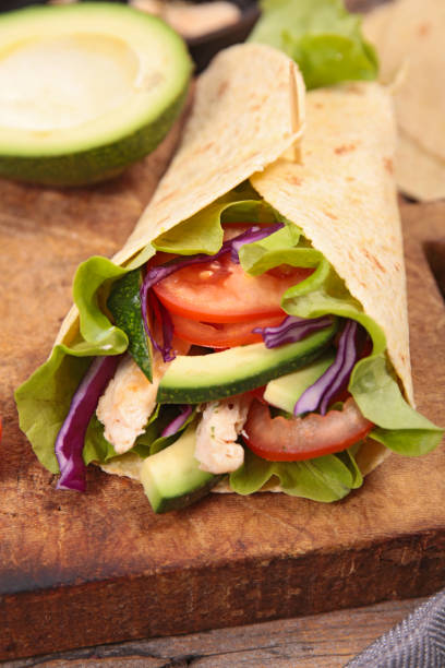 istock sandwich wrap, tortilla bread and vegetable 1009081410