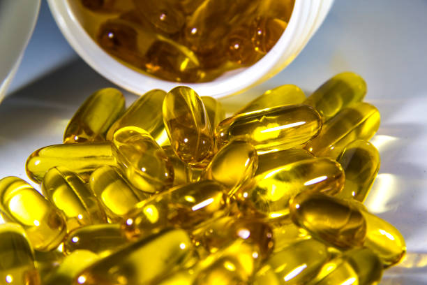 istock fish oil capsules, medicine 1009085772