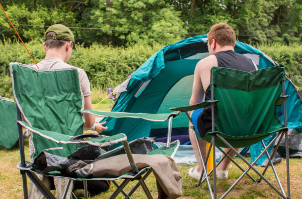 istock men enjoying the camping trip 1009095110