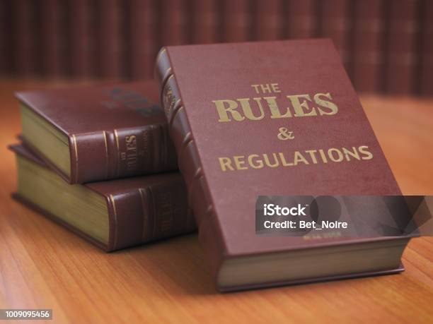 Rules An Regulations Books With Official Instructions And Directions Of Organization Or Team Stock Photo - Download Image Now