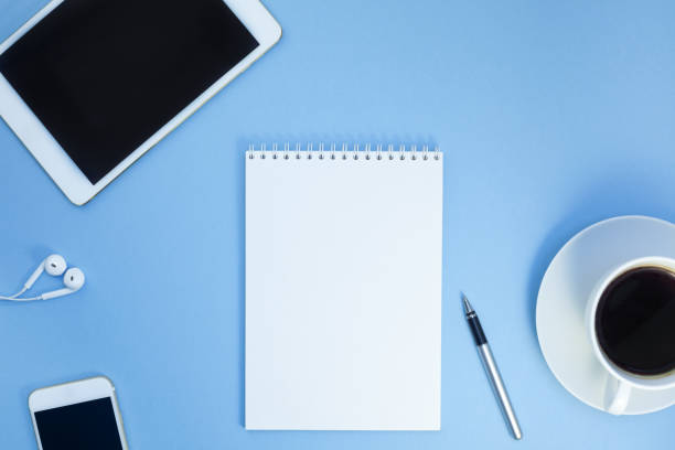 istock Creative flat lay photo of workspace desk 1009104484