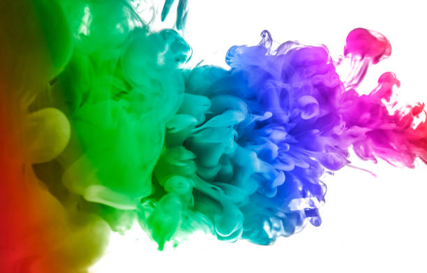 istock colorful dye in water on white background 1009129358
