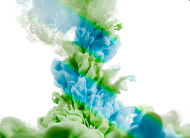istock colorful dye in water on white background 1009129706