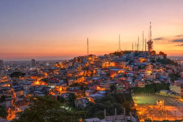 Glorios sunset over Guayaquil, Ecuador with focus on Cerro del Carmel (Carmel Hill) as seen from Cerro de Santa Ana (St. Ana Hill)