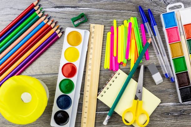 istock School supplies on a grey background 1009130018