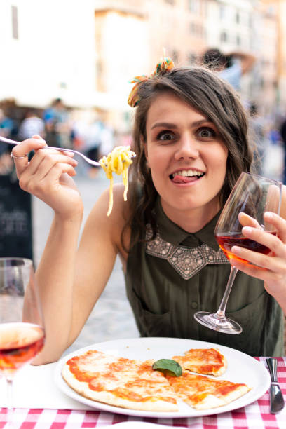 istock Happy woman in a restaurant 1009140022