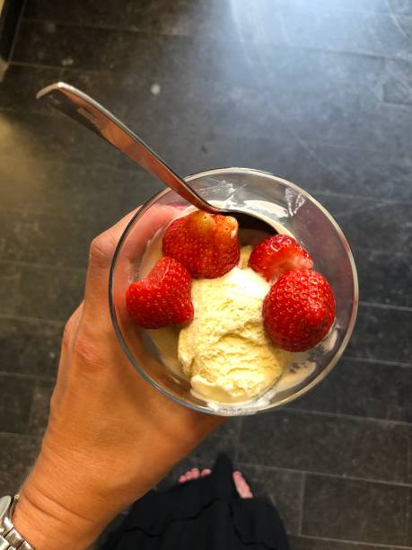 Vanilla ice cream and fresh strawberries
