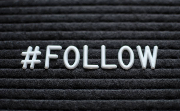 istock Hashtag word # follow written on the letter board. 1009168978