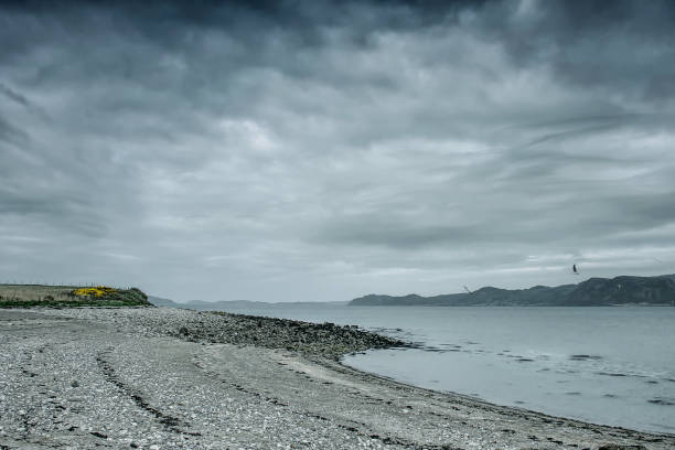 istock Dramatic sky over scenic Anglesey coastline in North Wales,Uk. 1009171534