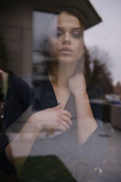 istock Sensual girl in window 1009183450