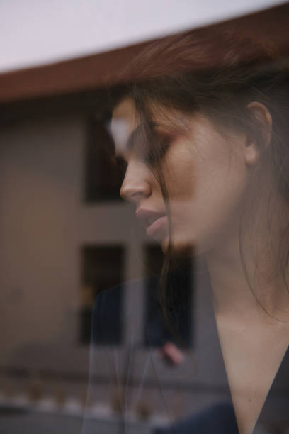istock Sensual girl in window 1009183454