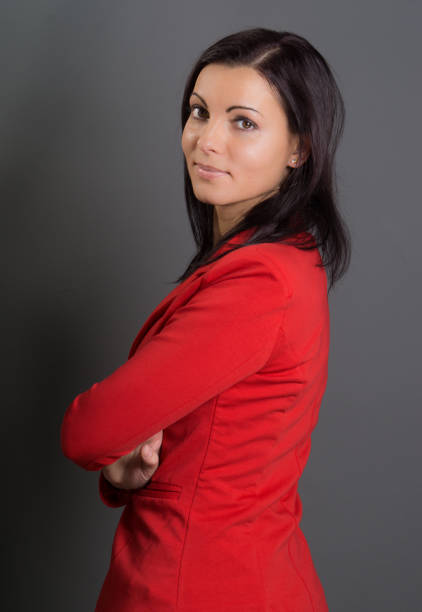 istock Smiling businesswoman over gray background 1009205768
