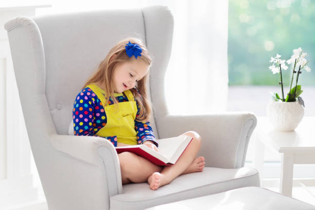 istock Child reading book. Kids read books. 1009213338