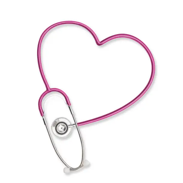 Photo of Doctor's stethoscope in heart shape  pink color isolated on white background with clipping path