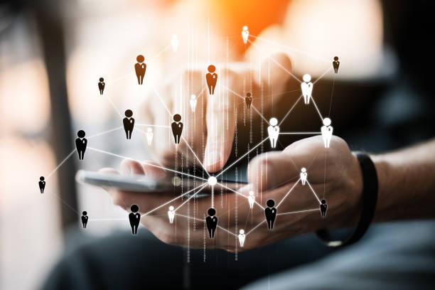 istock business people hand use blank screen smartphone with blur background 1009216156