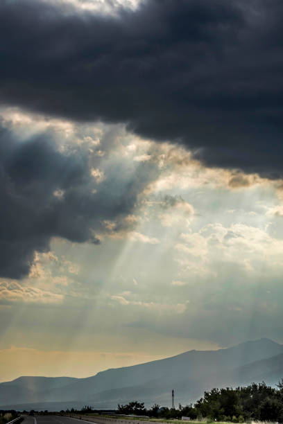 istock Dramatic stormy sky over road in Greece 1009216560