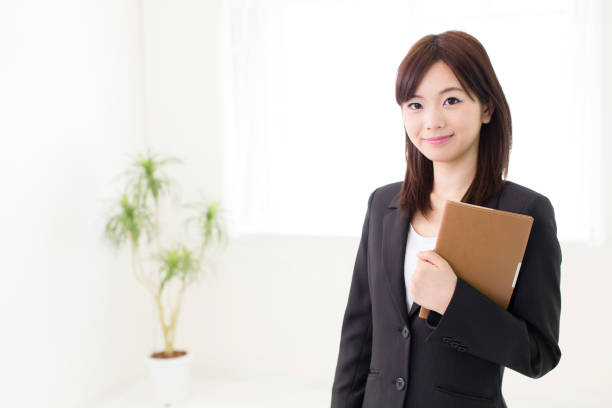 istock asian businesswoman working in office 1009219432