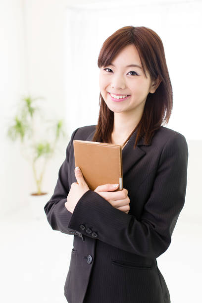 istock asian businesswoman working in office 1009219454