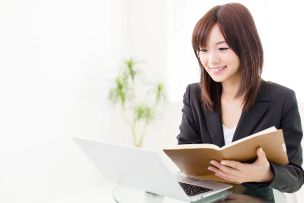 istock asian businesswoman working in office 1009219584