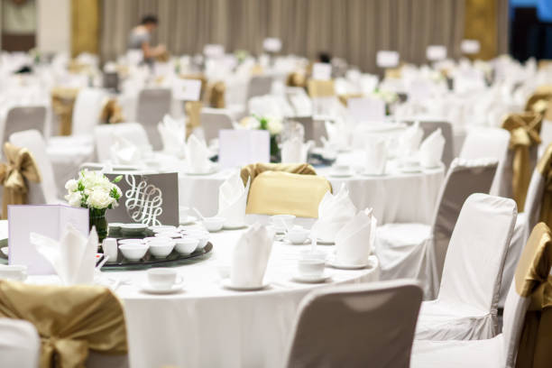 istock wedding table sets in wedding hall. wedding decorate preparation. 1009226700
