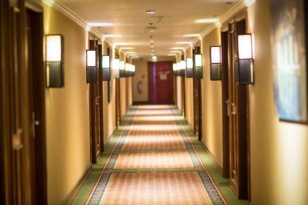 istock Walkway on the floor in mansion. many doors room between the walkway. 1009229136