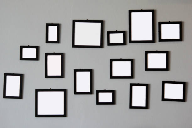 istock pile of empty wooden picture frames on wall 1009233574