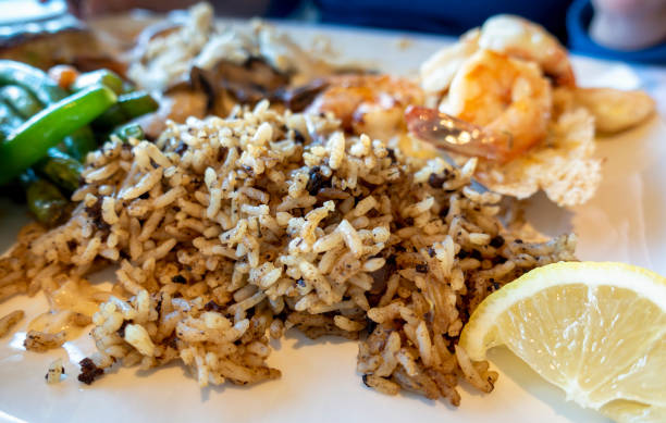 istock Flavored rice, shrimp and vegetables on a plate 1009254226