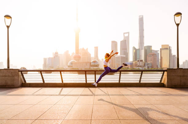 istock Young women Running in urban scene 1009266632
