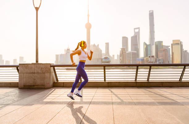 istock Young women Running in urban scene 1009266650