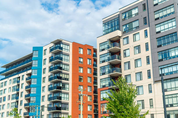 modern condo buildings with huge windows in montreal - condominium complex imagens e fotografias de stock