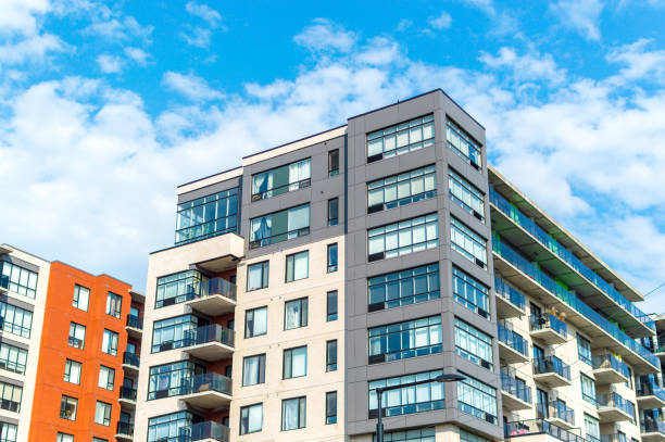 istock Modern condo buildings with huge windows in Montreal 1009266936