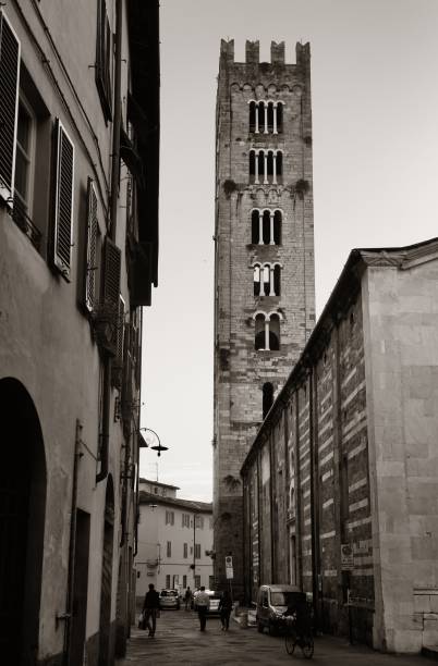 Lucca tower street Lucca street view with bell tower in Italy lucca italy stock pictures, royalty-free photos & images