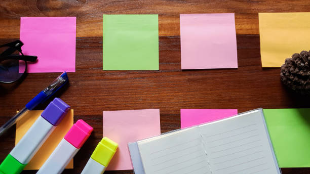 istock Notes paper and supplies on desktop wood table. Brainstorming Brainstorm concept 1009299180
