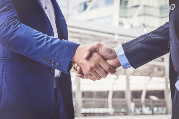 istock Businessmen making handshake. concept Successful businessmen 1009339626