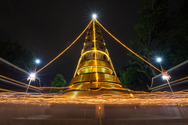istock Walk with light candle around pagoda temple at night 1009339826