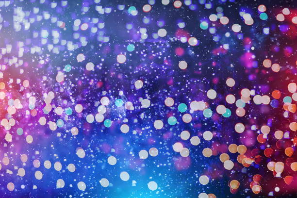 istock Abstract Festive background. Glitter vintage lights background with lights defocused. Christmas and New Year feast bokeh background with copyspace. 1009339832