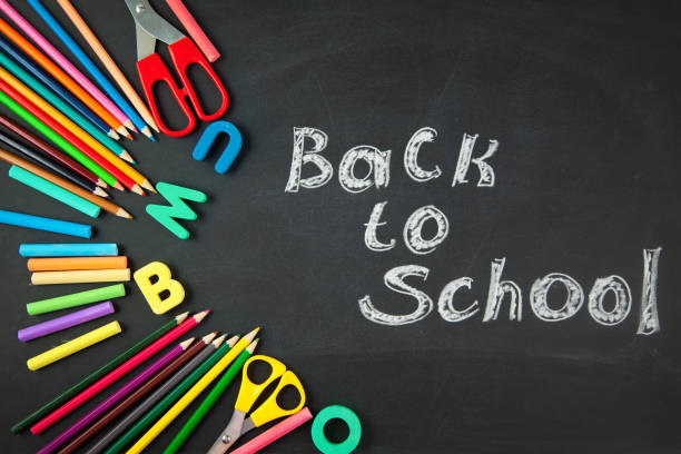 istock Back to school Accessories for school Pencils Plasticine letters Letters Alarm clock Briefcase Chalk . Top view 1009342168