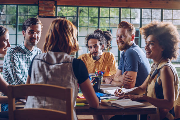 istock Large group of happy college students talking about upcoming exams. 1009345562