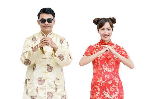 Young chinese new year couple. isolated background with clipping path