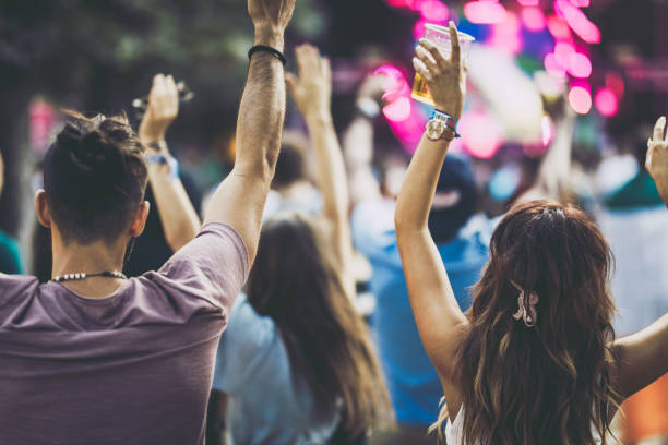 istock Put your hands up high for this song! 1009350568