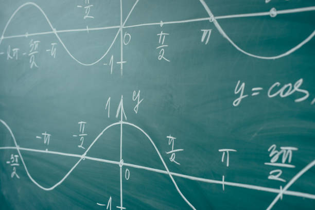 Math lesson. Sine and cosine functions. Graphics graphics drawn on the Board Math lesson. Sine and cosine functions. Graphics graphics drawn on the Board. mathematical function stock pictures, royalty-free photos & images