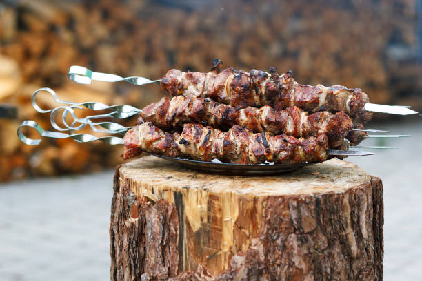 istock Freshly prepared pork barbecue on skewers. 1009359298
