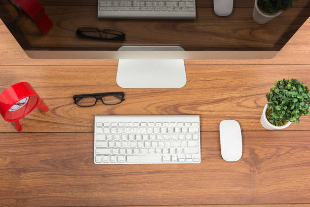istock Business office top view computer monitor 1009376258