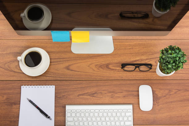istock Business office top view computer monitor 1009376324