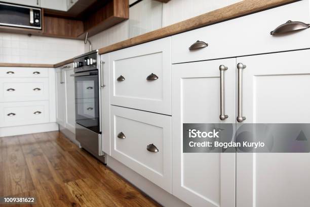 Stylish Light Gray Handles On Cabinets Closeup Kitchen Interior With Modern Furniture And Stainless Steel Appliances Kitchen Design In Scandinavian Style Stock Photo - Download Image Now