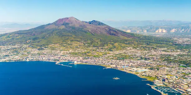 Napoli (Naples) and mount Vesuvius in the background at sunrise in a summer day, Italy, Campania