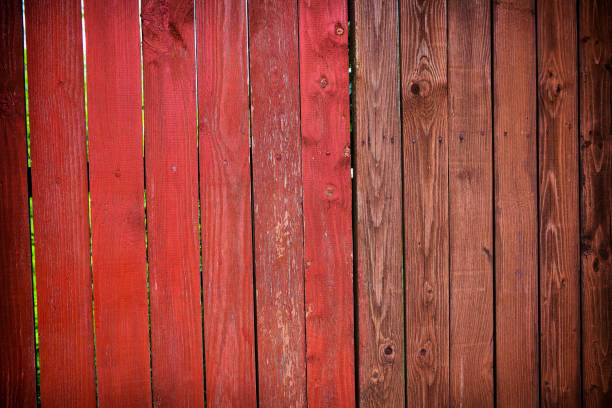 istock red wooden fence texture 1009386400