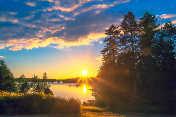 Summer night lake view from Sotkamo, Finland. Summer night lake view from Sotkamo, Finland. midnight sun stock pictures, royalty-free photos & images