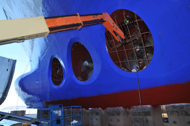 istock Propeller under reconstruction. Under the ship. Big ship under repairing on dry dock 1009414632